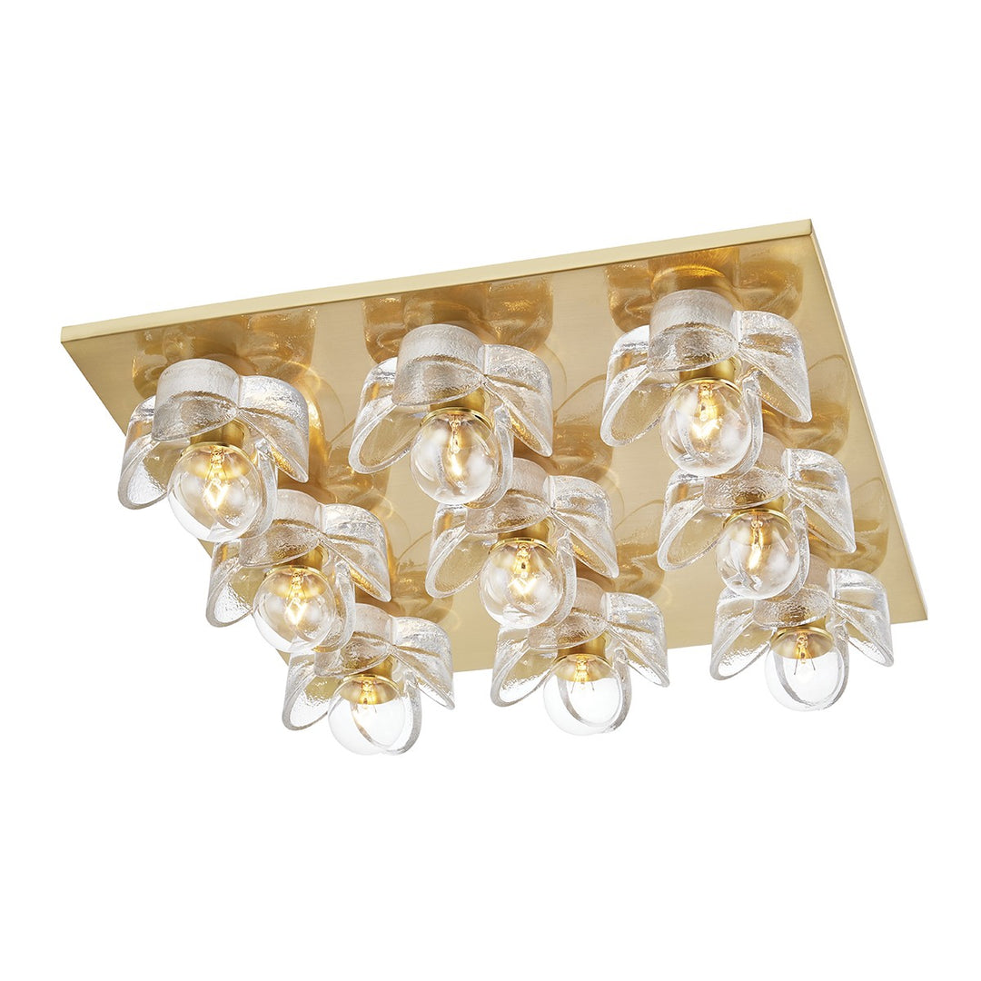 Shea Nine Light Flush Mount in Aged Brass - available from The Lighting Shoppe, trusted by Canadian homeowners