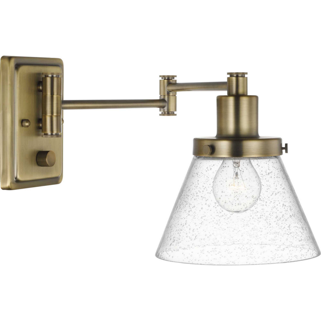 Hinton One Light Swing Arm Wall Lamp in Vintage Brass - available from The Lighting Shoppe, trusted by Canadian homeowners