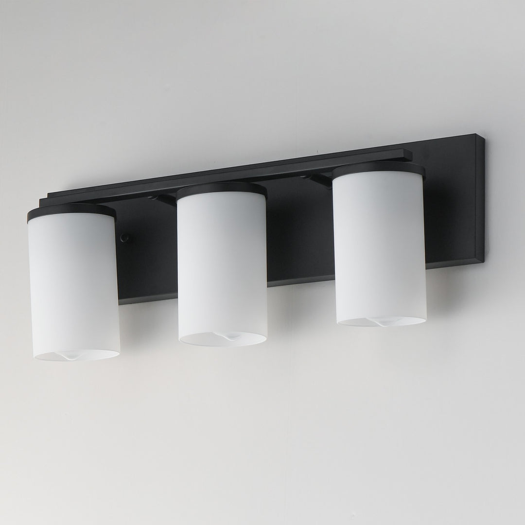 Maxim - 10283SWBK - Three Light Bath Vanity - Lateral - Black