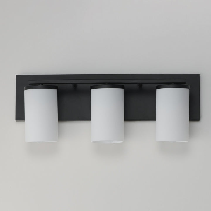 Maxim - 10283SWBK - Three Light Bath Vanity - Lateral - Black