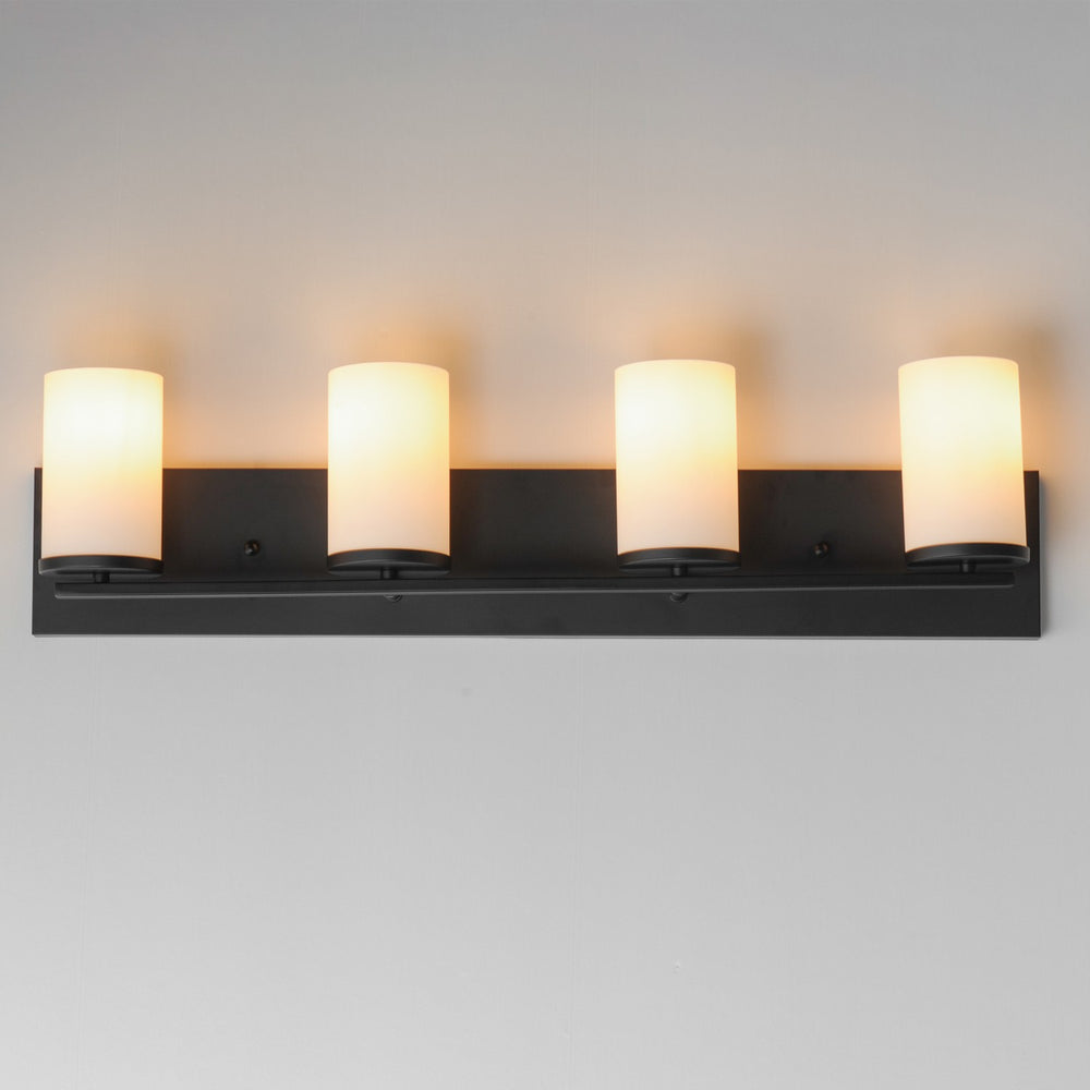 Maxim - 10284SWBK - Four Light Bath Vanity - Lateral - Black