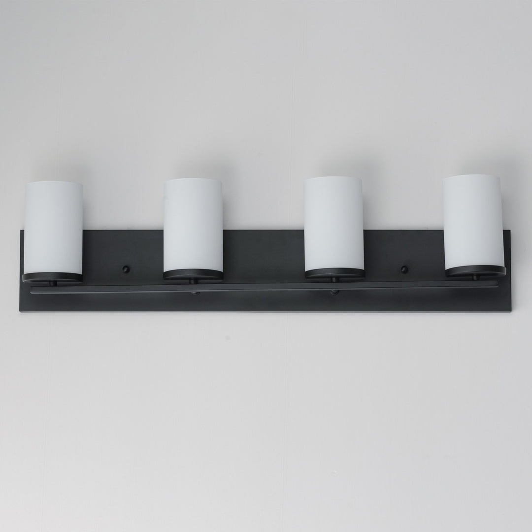 Maxim - 10284SWBK - Four Light Bath Vanity - Lateral - Black