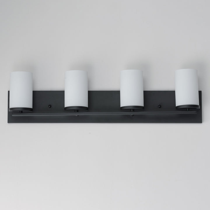 Maxim - 10284SWBK - Four Light Bath Vanity - Lateral - Black