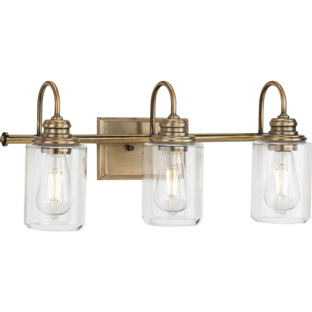 Aiken Three Light Bath Bracket in Vintage Brass - available from The Lighting Shoppe, trusted by Canadian homeowners