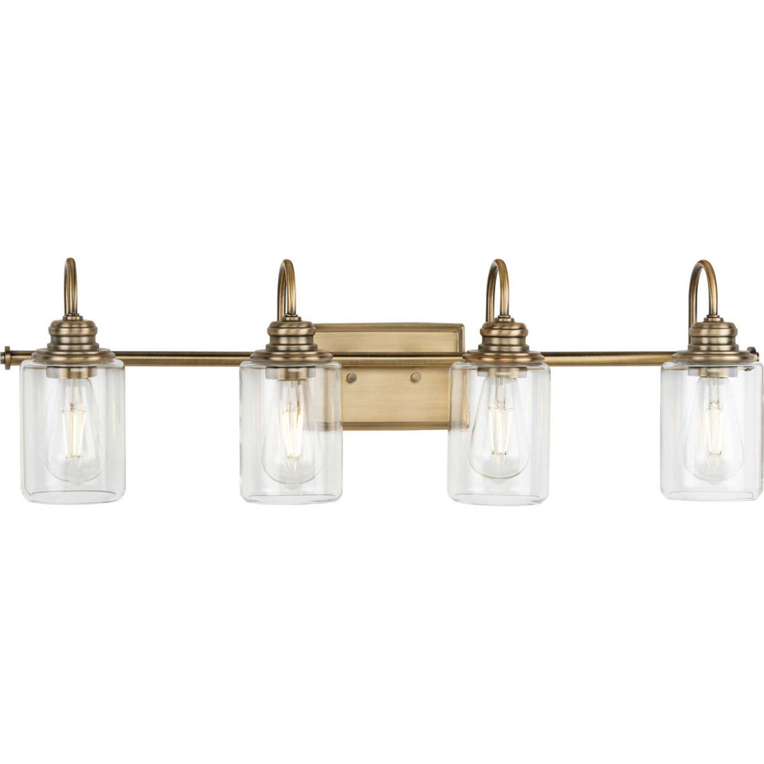 Aiken Four Light Bath Bracket in Vintage Brass - available from The Lighting Shoppe, trusted by Canadian homeowners