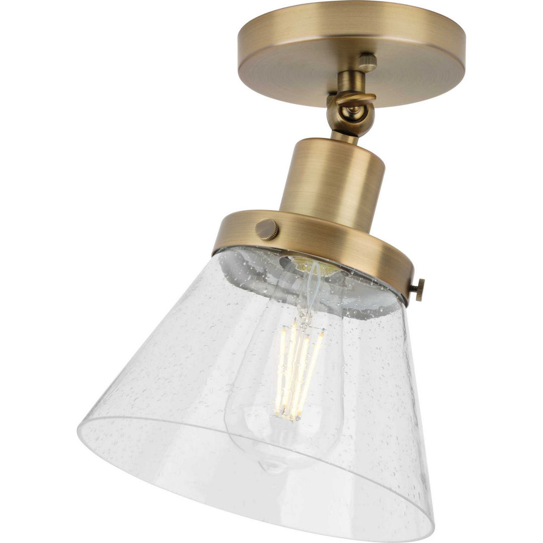 Hinton One Light Flush Mount in Vintage Brass - available from The Lighting Shoppe, trusted by Canadian homeowners