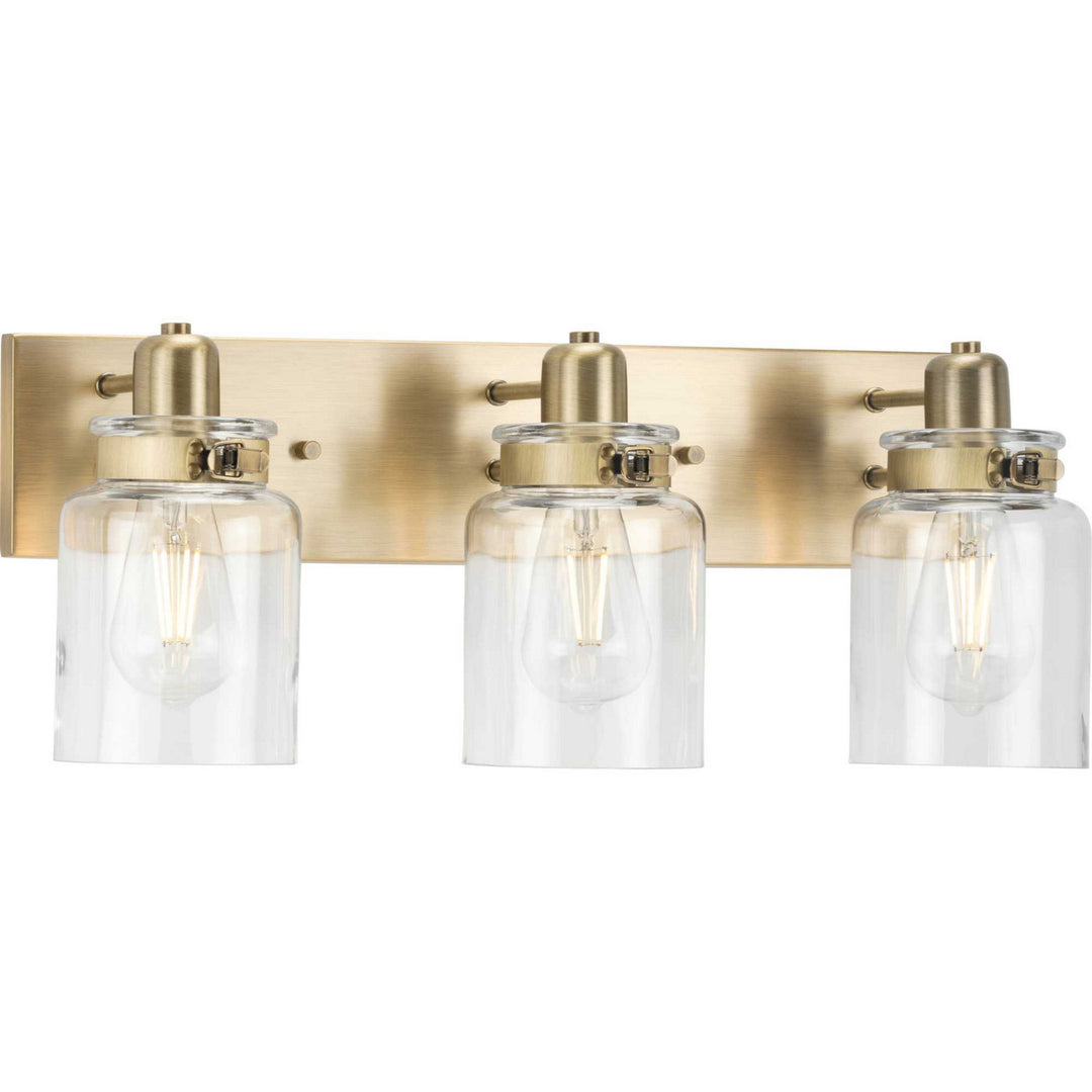 Calhoun Three Light Bath Bracket in Vintage Brass - available from The Lighting Shoppe, trusted by Canadian homeowners