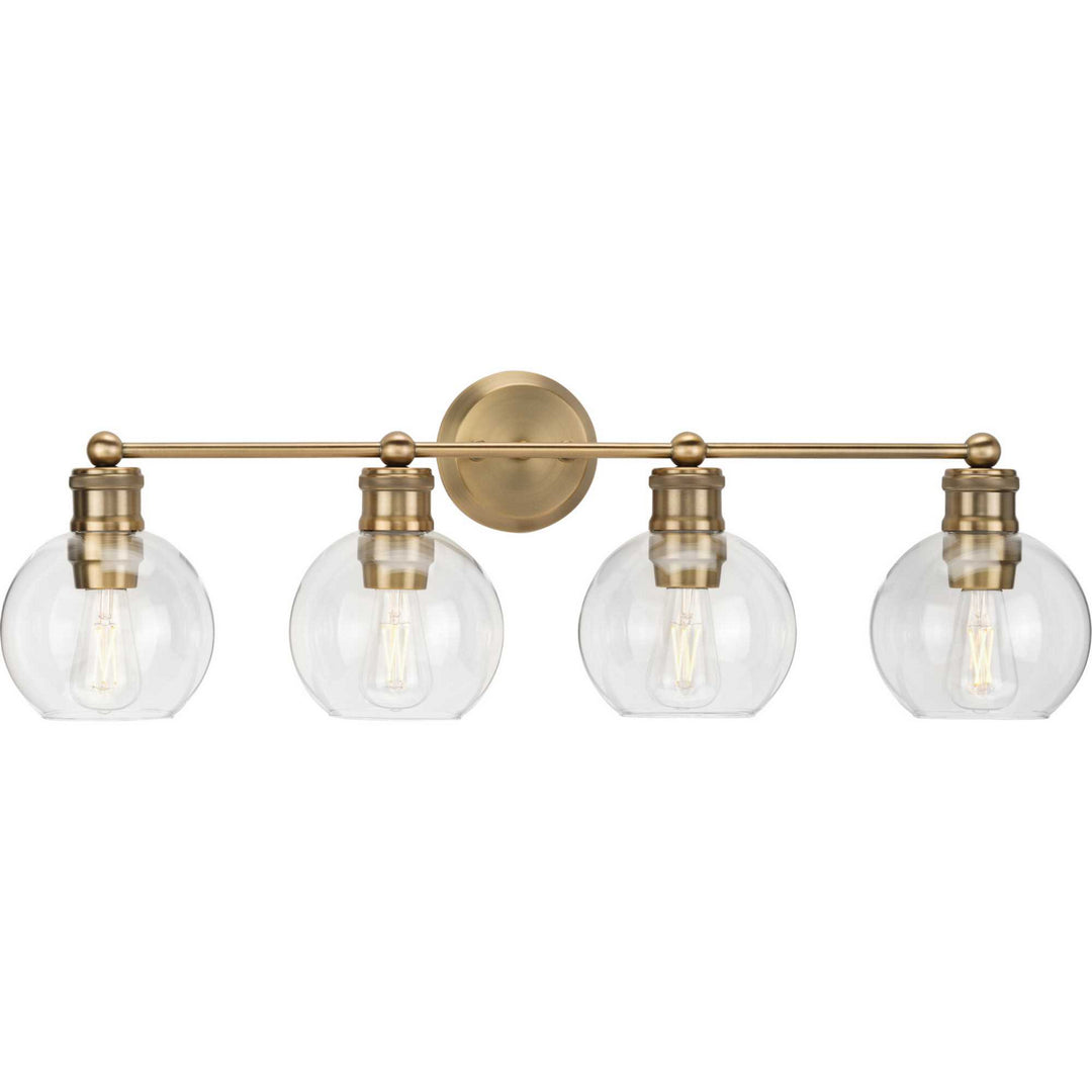 Hansford Four Light Bath Bracket in Vintage Brass - available from The Lighting Shoppe, trusted by Canadian homeowners
