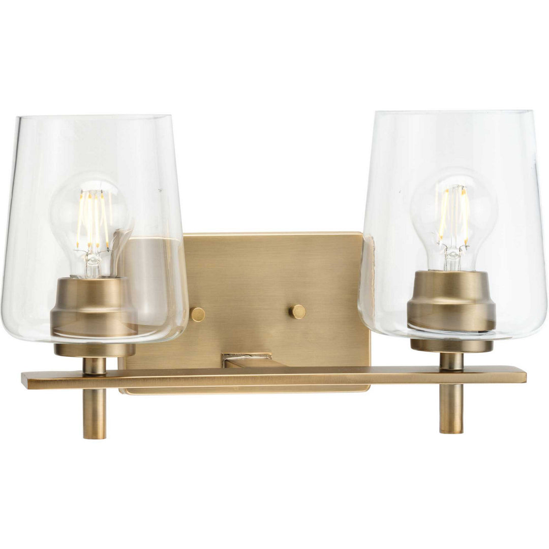 Calais Two Light Bath Vanity in Vintage Brass - available from The Lighting Shoppe, trusted by Canadian homeowners