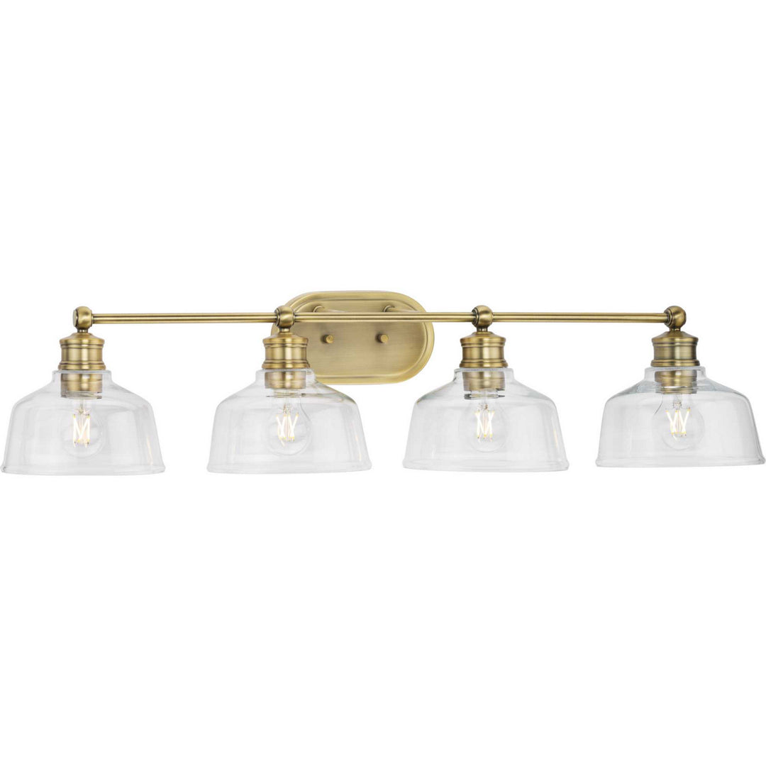 Singleton Four Light Bath in Vintage Brass - available from The Lighting Shoppe, trusted by Canadian homeowners