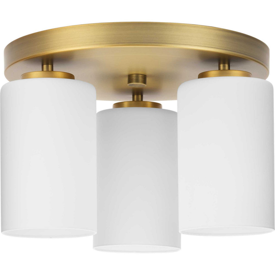Cofield Three Light Flush Mount in Vintage Brass - available from The Lighting Shoppe, trusted by Canadian homeowners