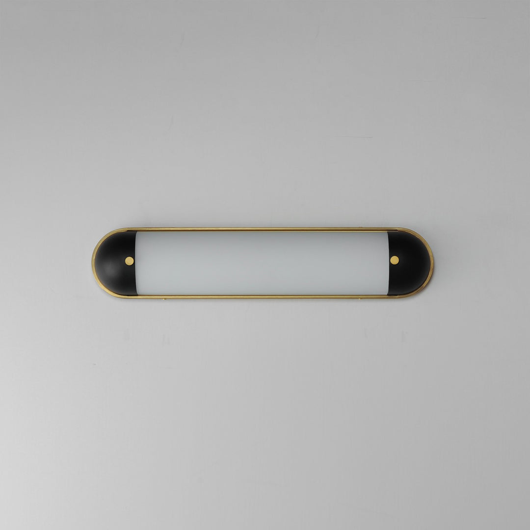 Maxim - 39562SWBKNAB - LED Bath Vanity - Capsule - Black / Natural Aged Brass