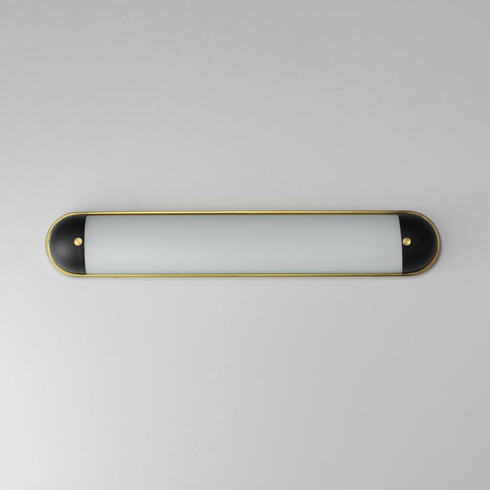Maxim - 39563SWBKNAB - LED Bath Vanity - Capsule - Black / Natural Aged Brass