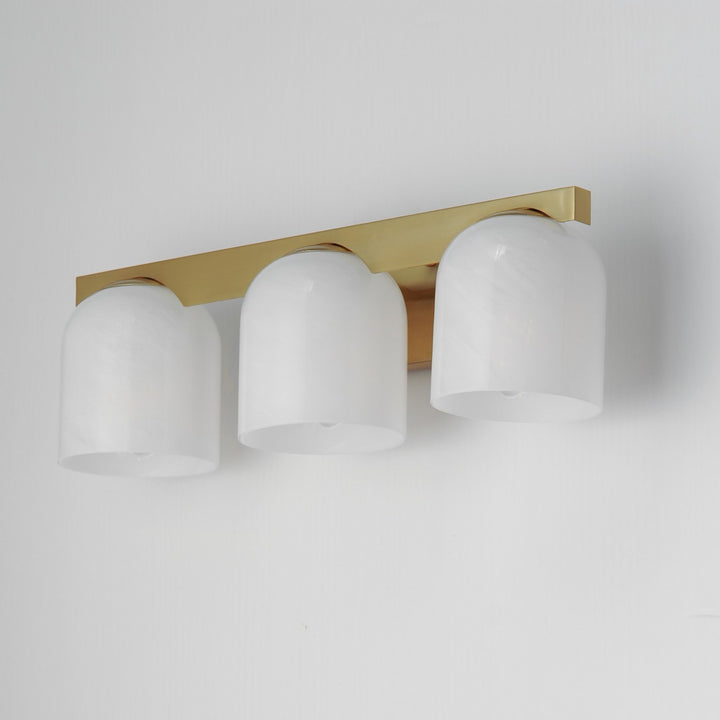 Maxim - 21233MRNAB - Three Light Bath Vanity - Scoop - Natural Aged Brass