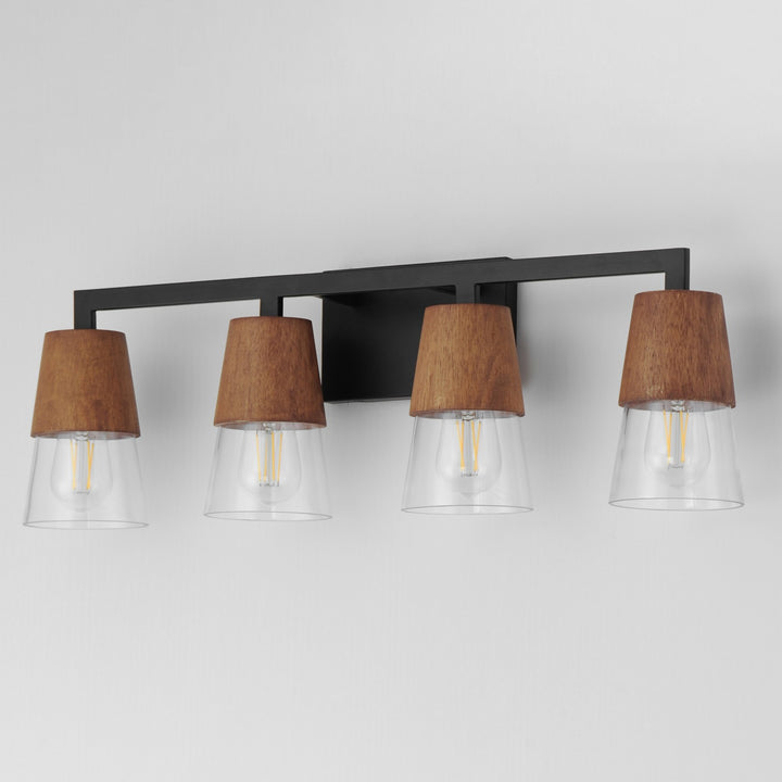 Maxim - 21624CLWNBK - Four Light Bath Vanity - Carpenter - Walnut / Black