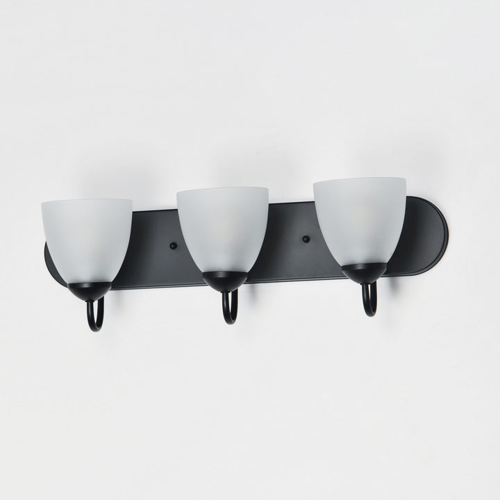 Maxim - 11383FTBK - Three Light Bath Vanity - Axis - Black