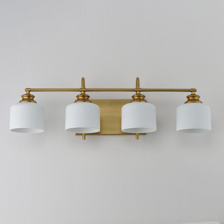 Maxim - 21494WTNAB - Four Light Bath Vanity - Bisque - Natural Aged Brass