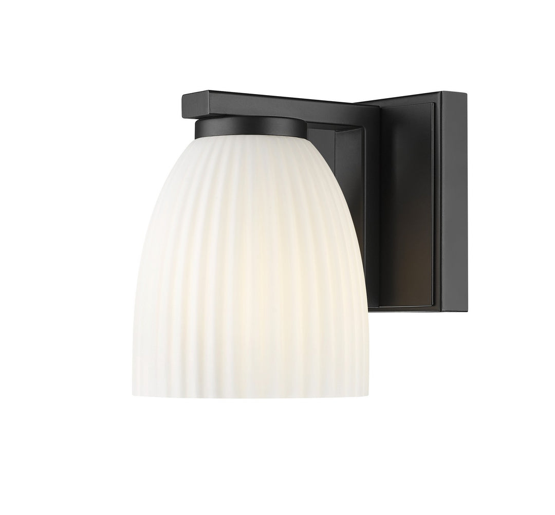 Naya One Light Wall Sconce in Matte Black - available from The Lighting Shoppe, trusted by Canadian homeowners