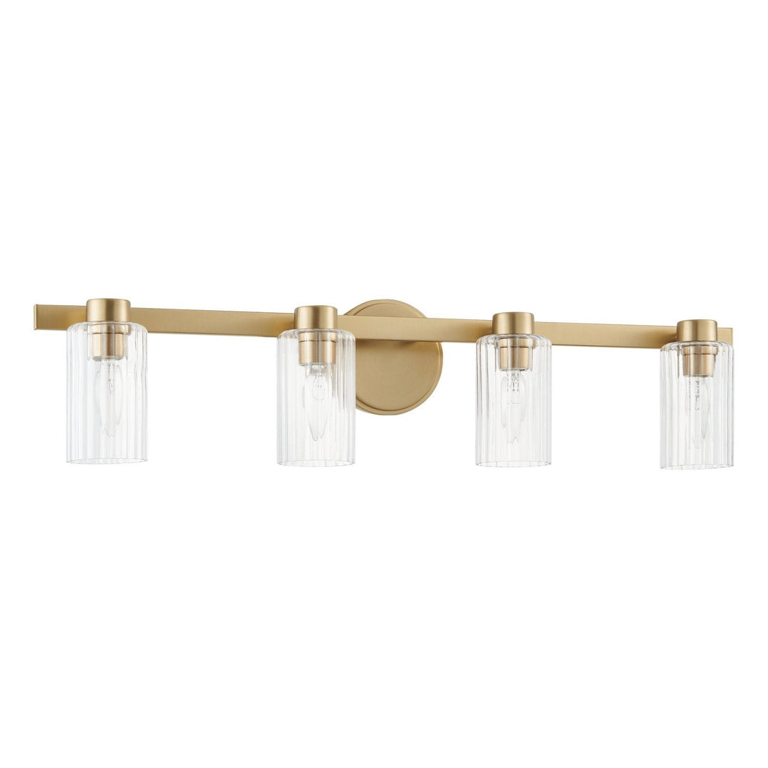 Bedminster Four Light Vanity in Champagne Gold, Clear Ribbed Thesis Canada