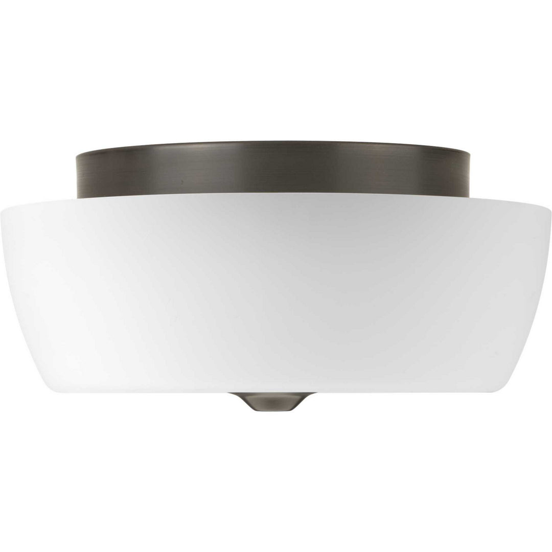 Leap Two Light Flush Mount in Antique Bronze - available from The Lighting Shoppe, trusted by Canadian homeowners