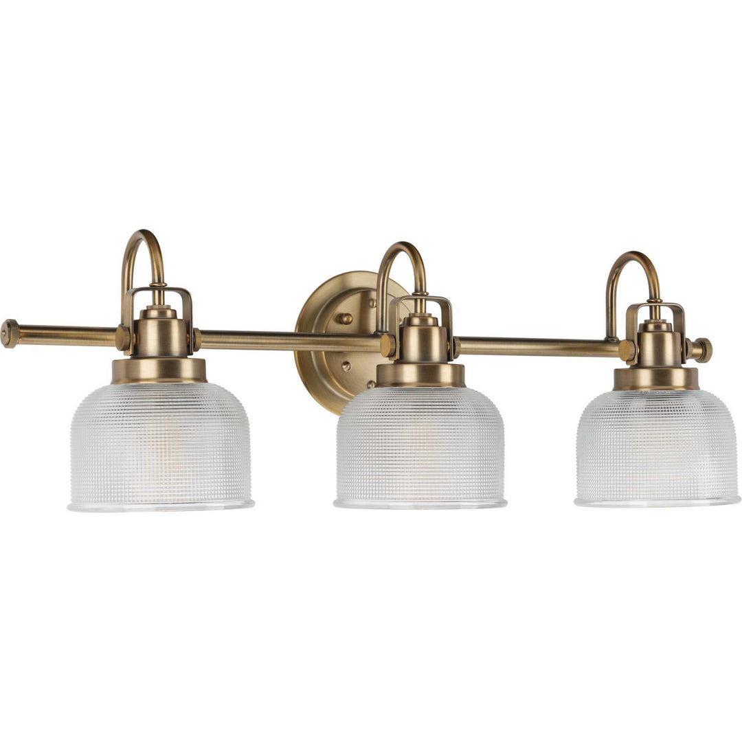 Archie Three Light Bath Bracket in Vintage Brass - available from The Lighting Shoppe, trusted by Canadian homeowners