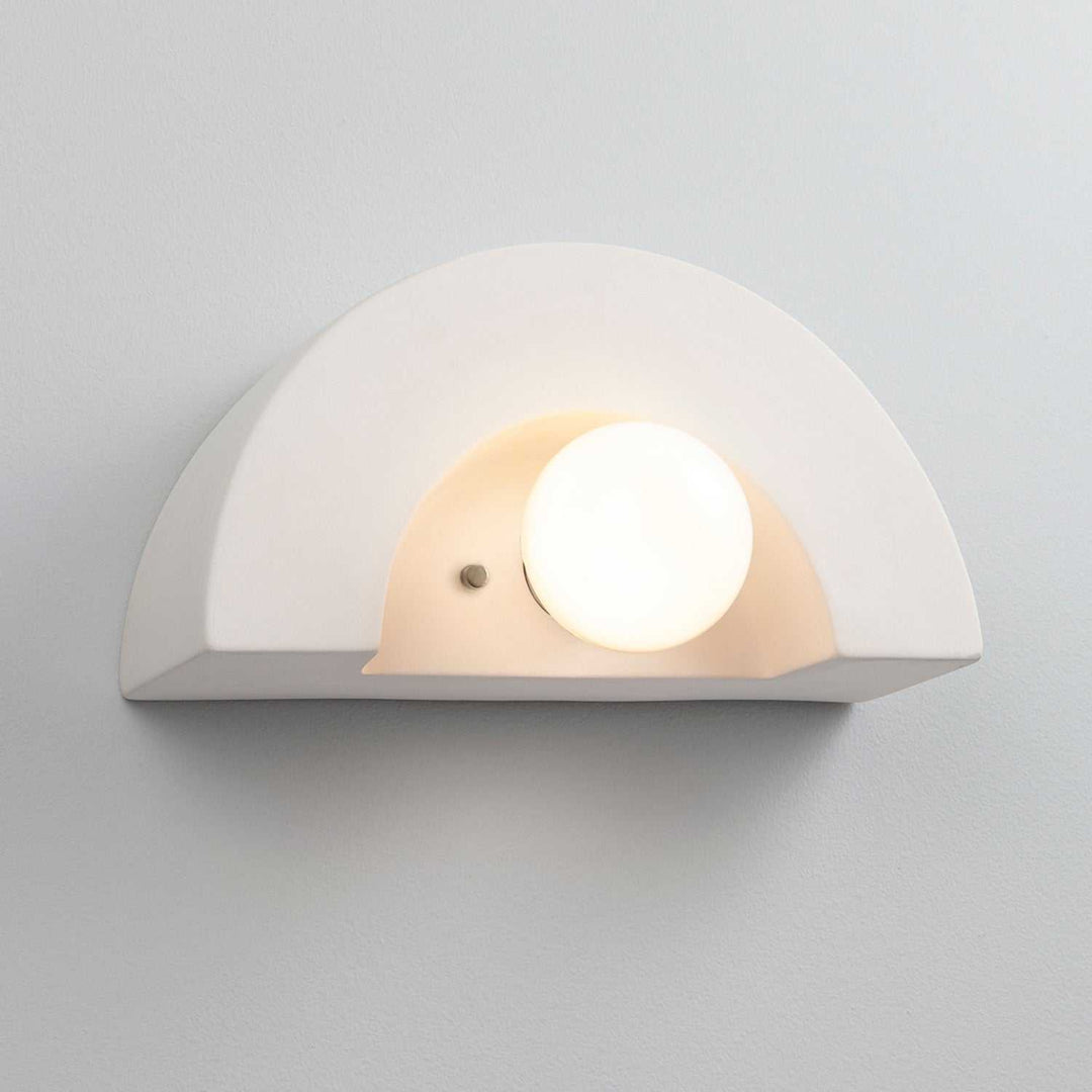 Ambiance Collection One Light Wall Sconce in Bisque Justice Designs