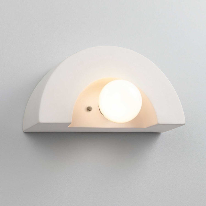 Ambiance Collection One Light Wall Sconce in Bisque Justice Designs