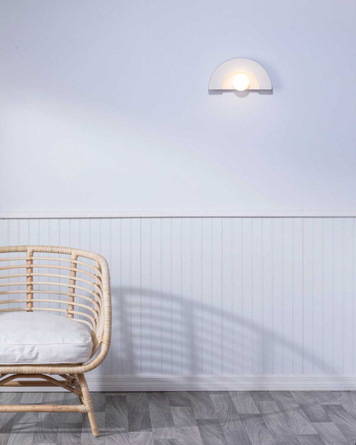 Ambiance Collection One Light Wall Sconce in Bisque Justice Designs