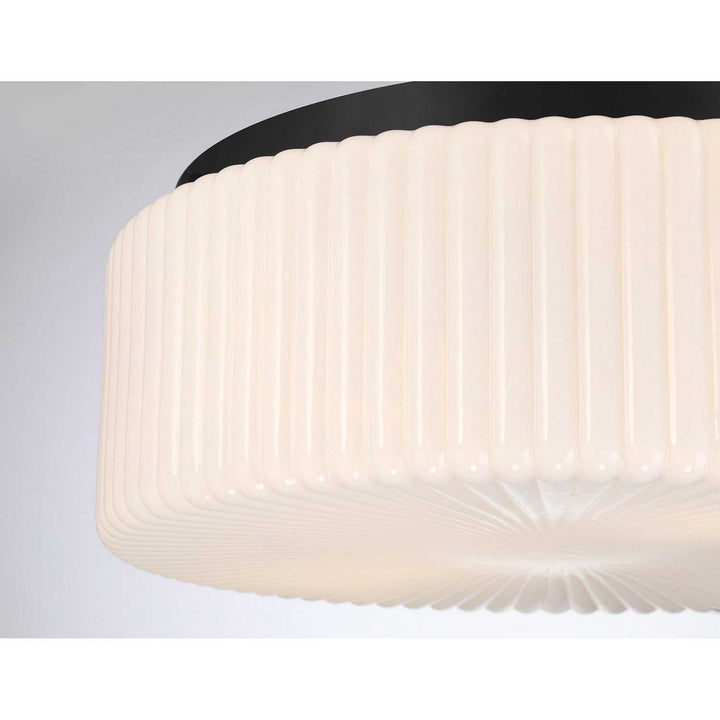 Edgemont Four Light Flush Mount in Matte Black Savoy House