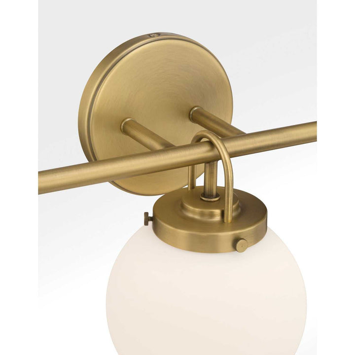 Ortesa Three Light Vanity in Legacy Brass Minka-Lavery