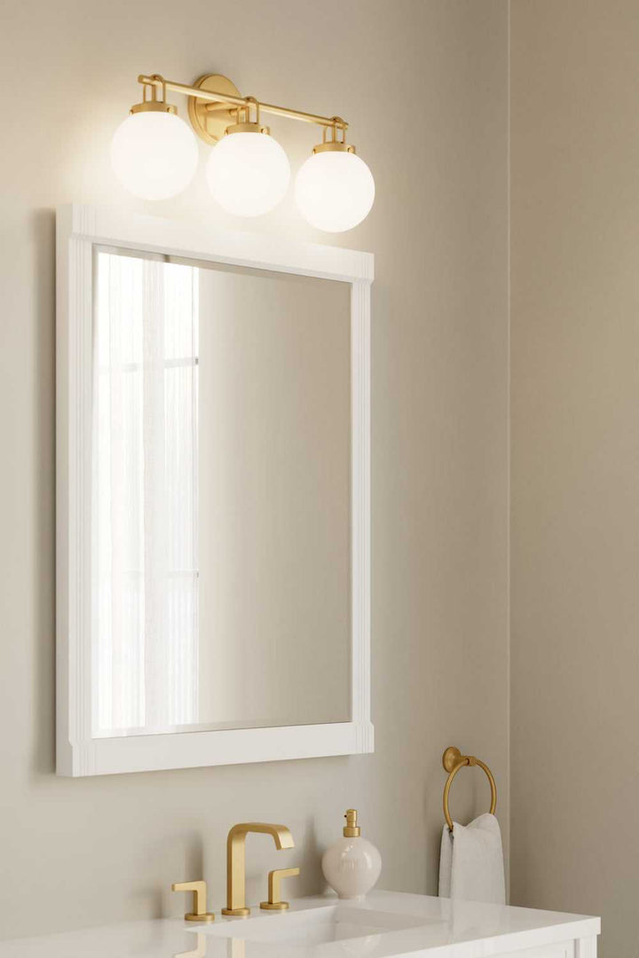 Ortesa Three Light Vanity in Legacy Brass Minka-Lavery