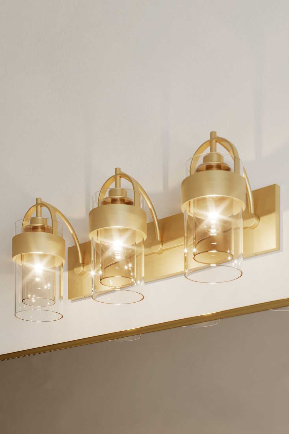 Ravik Three Light Vanity in Legacy Brass Minka-Lavery
