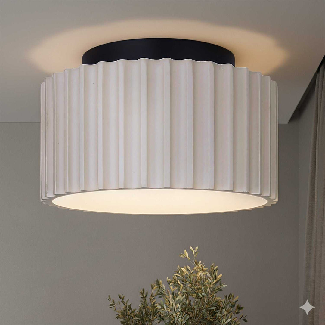 Tavi LED Flush Mount in Matte Black And Stone Canarm Canada