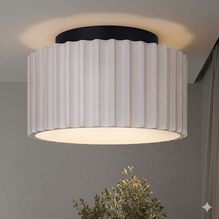 Tavi LED Flush Mount in Matte Black And Stone Canarm Canada