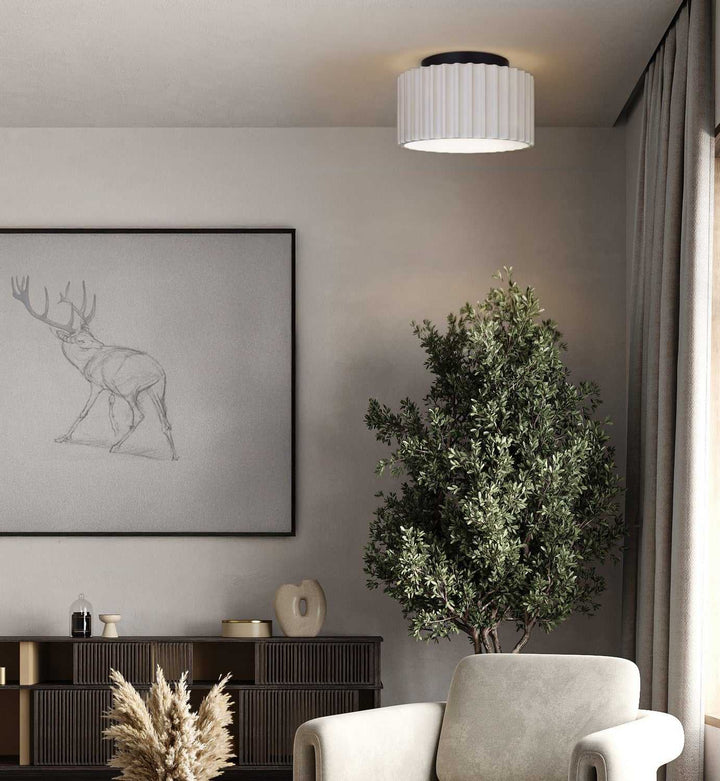 Tavi LED Flush Mount in Matte Black And Stone Canarm Canada