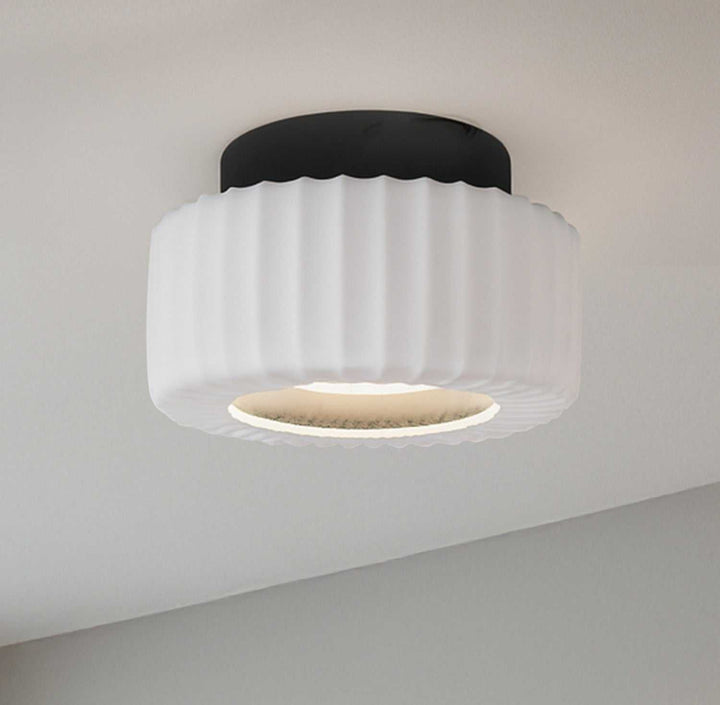 Dario LED Flush Mount in Matte Black And White Canarm Canada