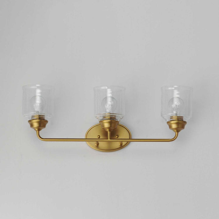 Maxim - 12263CDNAB - Three Light Bath Vanity - Acadia - Natural Aged Brass