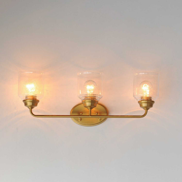 Maxim - 12263CDNAB - Three Light Bath Vanity - Acadia - Natural Aged Brass