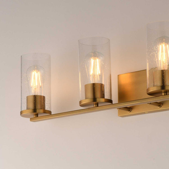 Maxim - 10464CDNAB - Four Light Bath Vanity - Livingston - Natural Aged Brass
