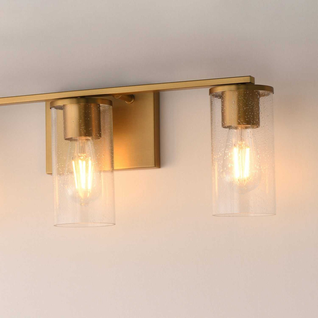 Maxim - 10463CDNAB - Three Light Bath Vanity - Livingston - Natural Aged Brass