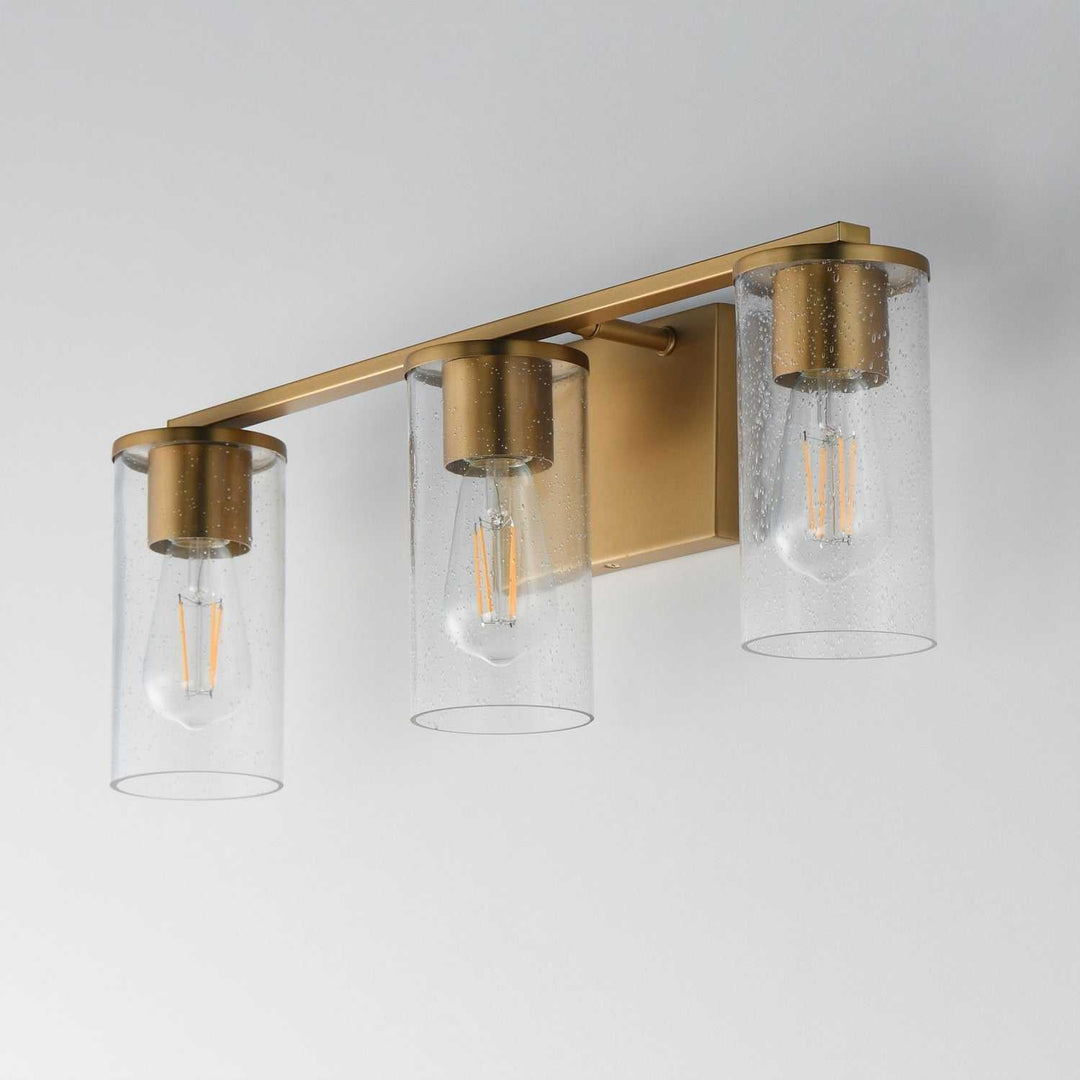 Maxim - 10463CDNAB - Three Light Bath Vanity - Livingston - Natural Aged Brass